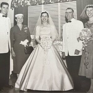 Vintage 1956 wedding dress. Only worn once. Purchased in San Francisco.